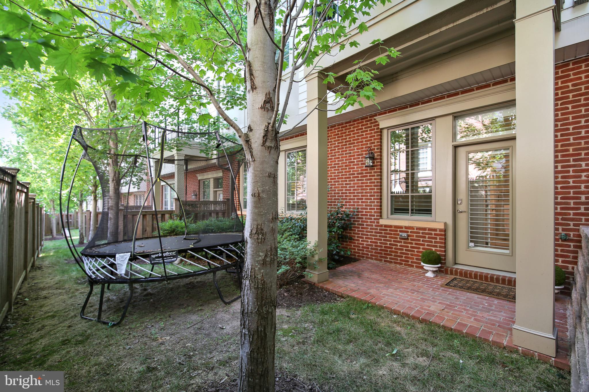 1411 Ridgeview Way Washington, DC 20007 - Photo 42 of 43 a backyard of a house with outdoor seating