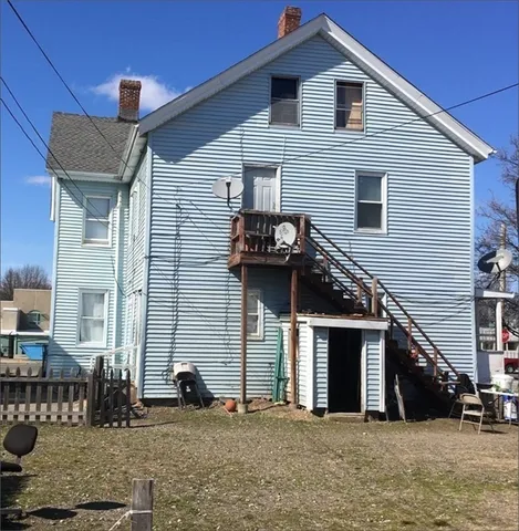 a front view of a house with garage