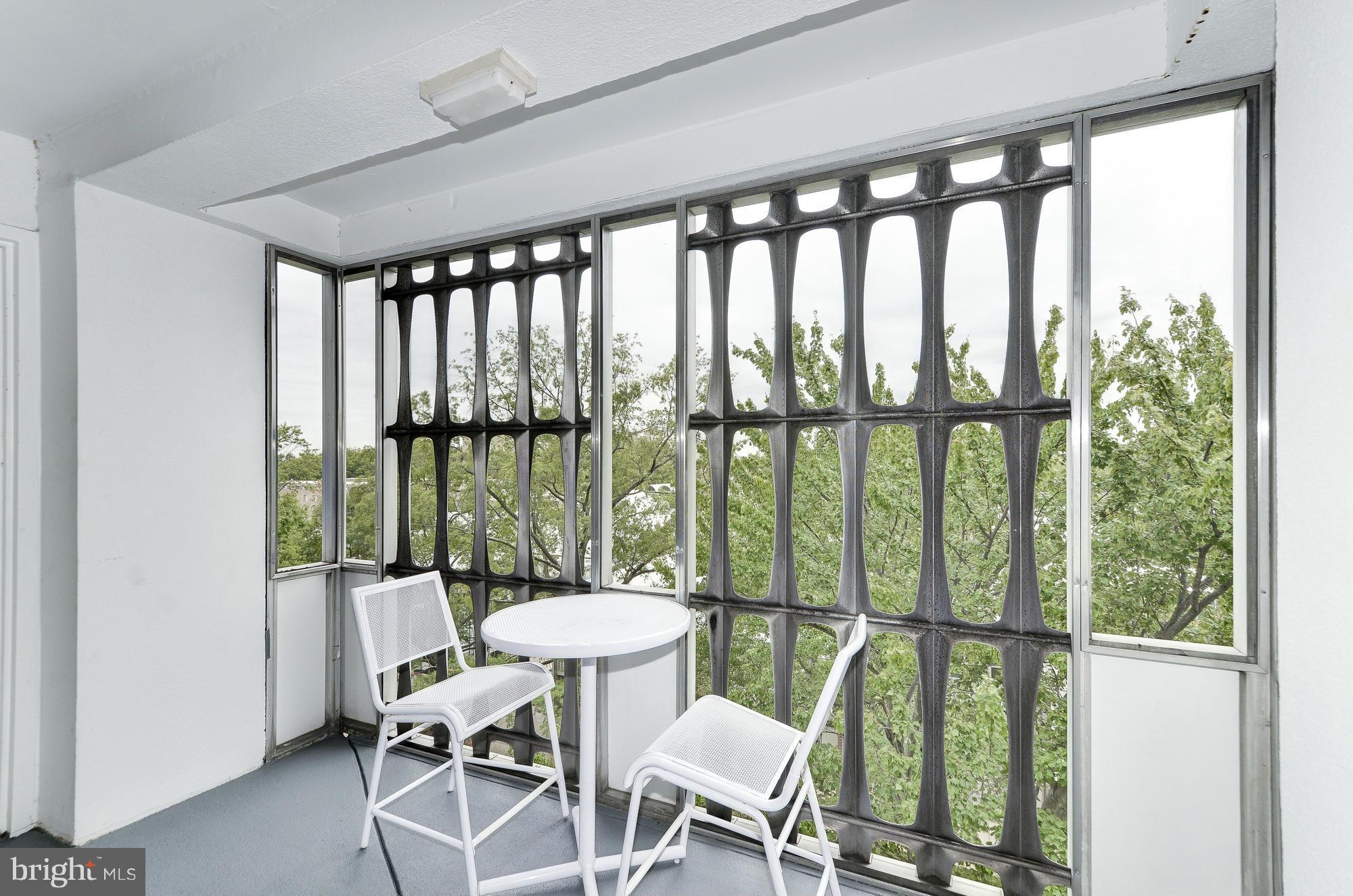 1301 Delaware Avenue Southwest, Unit N523 Washington, DC 20024 - Photo 15 of 26 a view of a balcony with chairs