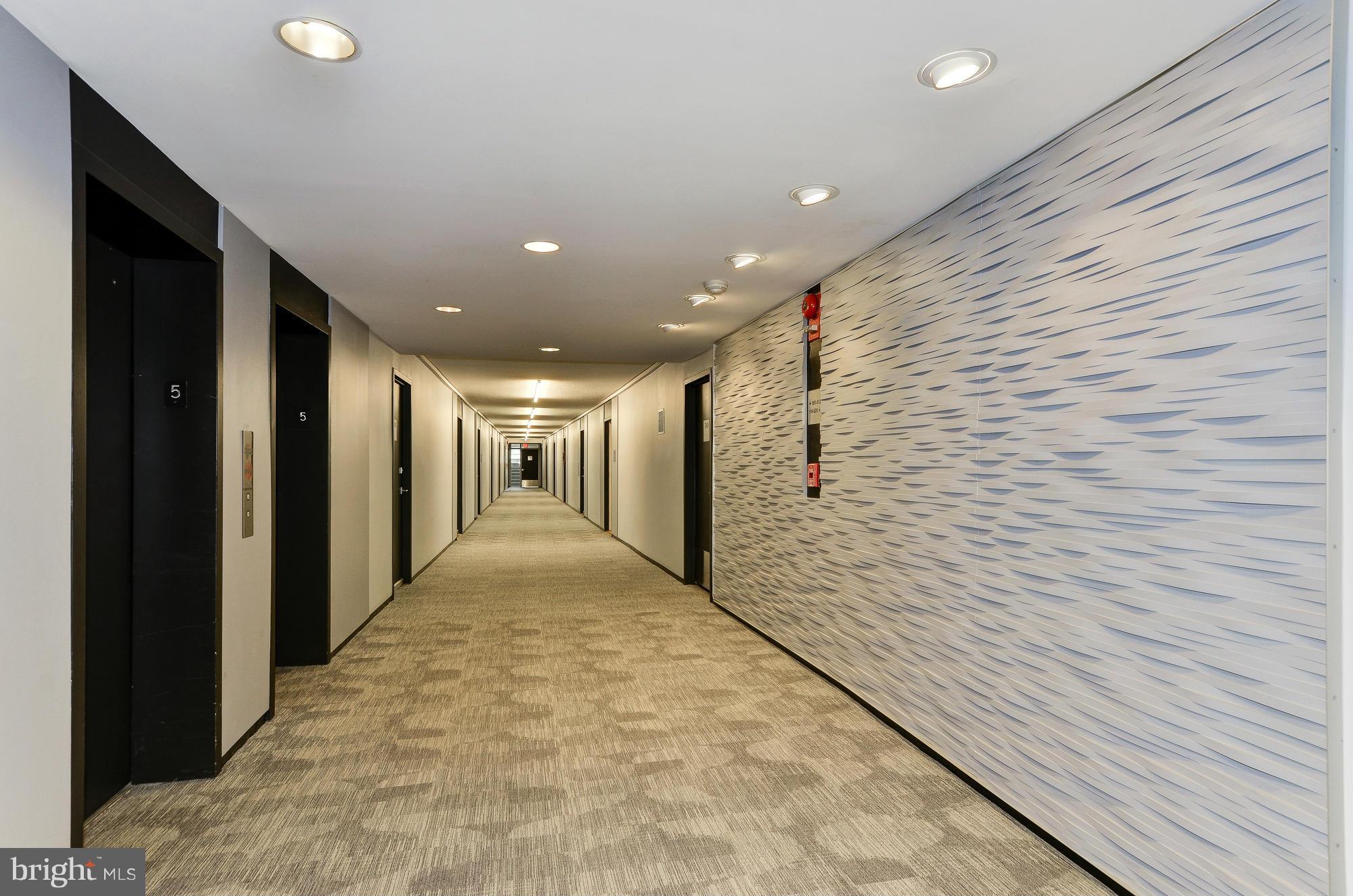 1301 Delaware Avenue Southwest, Unit N523 Washington, DC 20024 - Photo 17 of 26 a view of a hallway