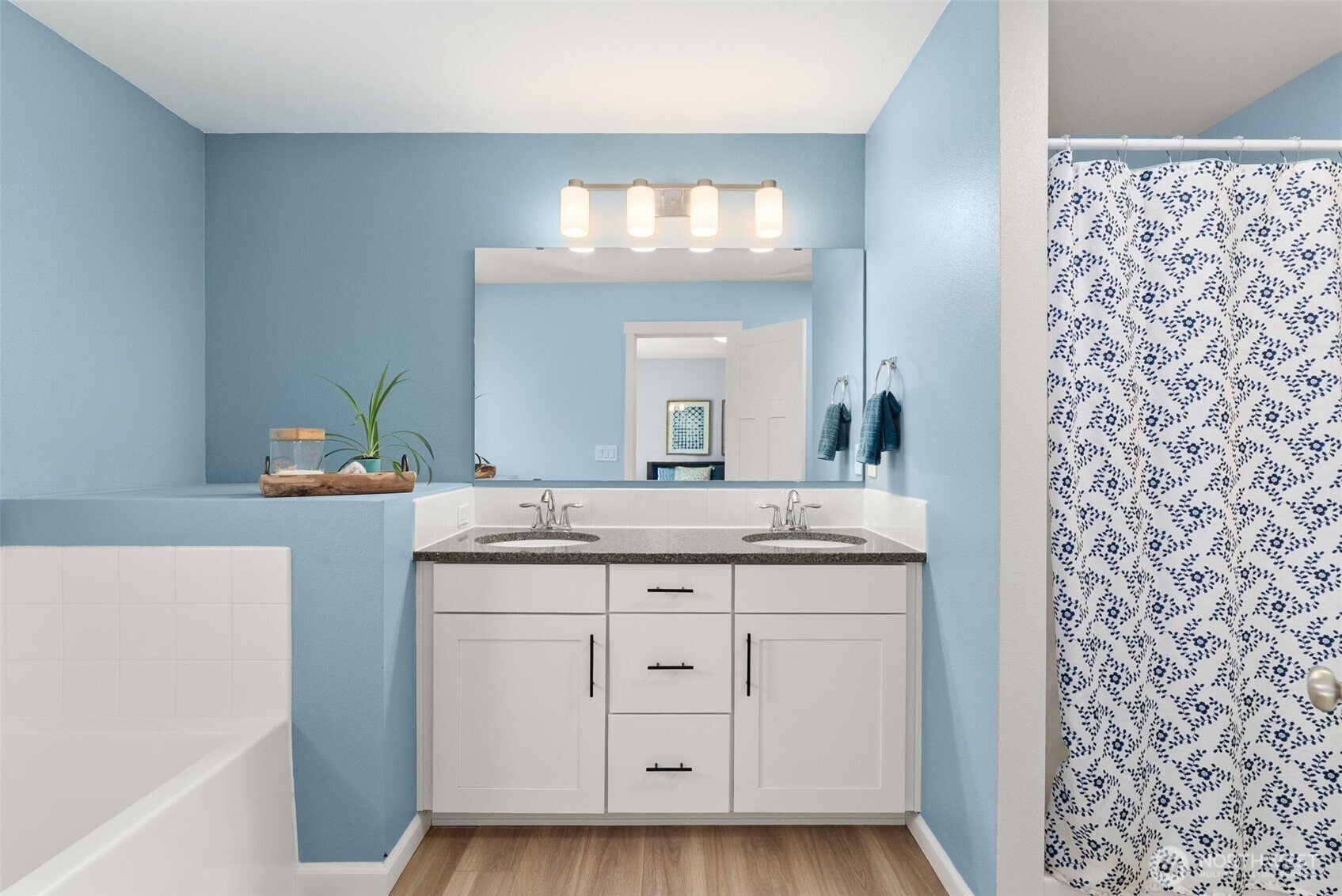 317 Cousins Road Chehalis, WA 98532 - Photo 16 of 40 a bathroom with a granite countertop sink and a mirror