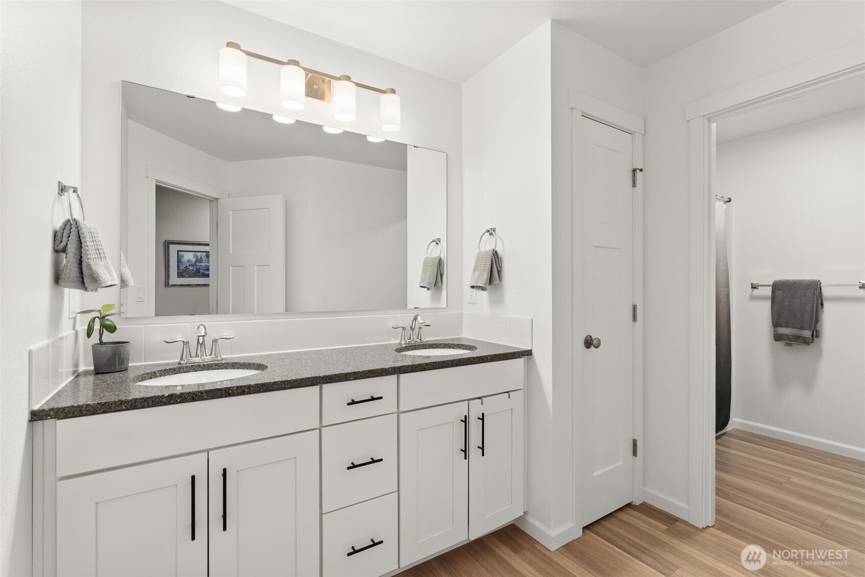 317 Cousins Road Chehalis, WA 98532 - Photo 20 of 40 a bathroom with a double vanity sink and mirror
