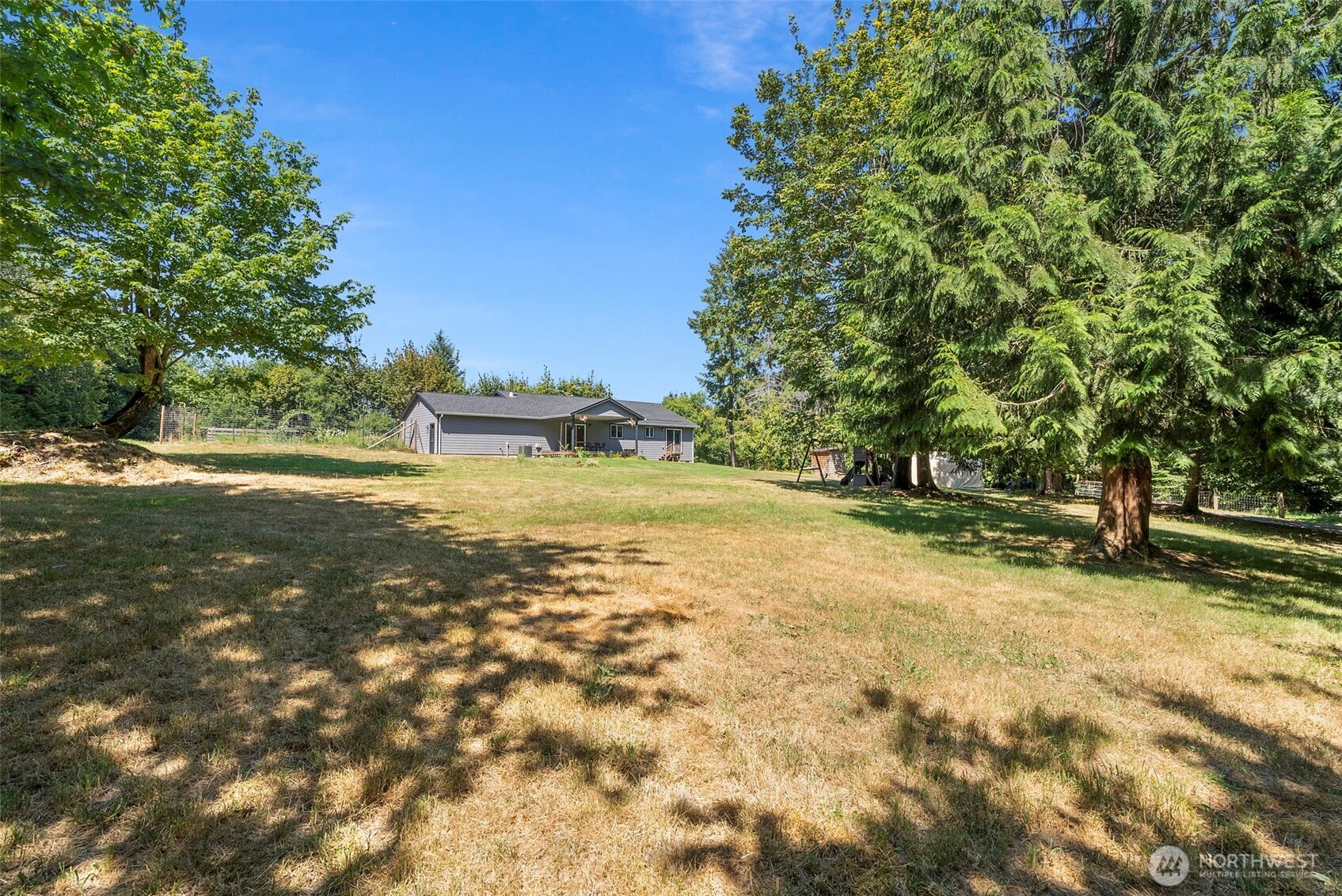 317 Cousins Road Chehalis, WA 98532 - Photo 28 of 40 a view of a yard with a tree