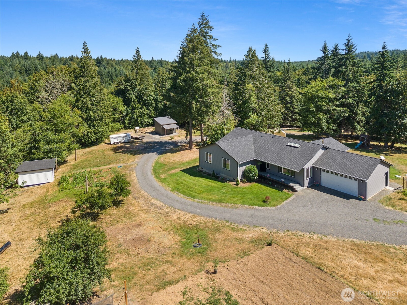317 Cousins Road Chehalis, WA 98532 - Photo 4 of 40 a view of a house with outdoor space and street view