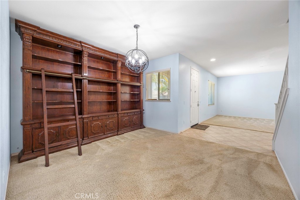 151 Ropango Way Hemet, CA 92545 - Photo 8 of 28 a view of an empty room with a cabinet