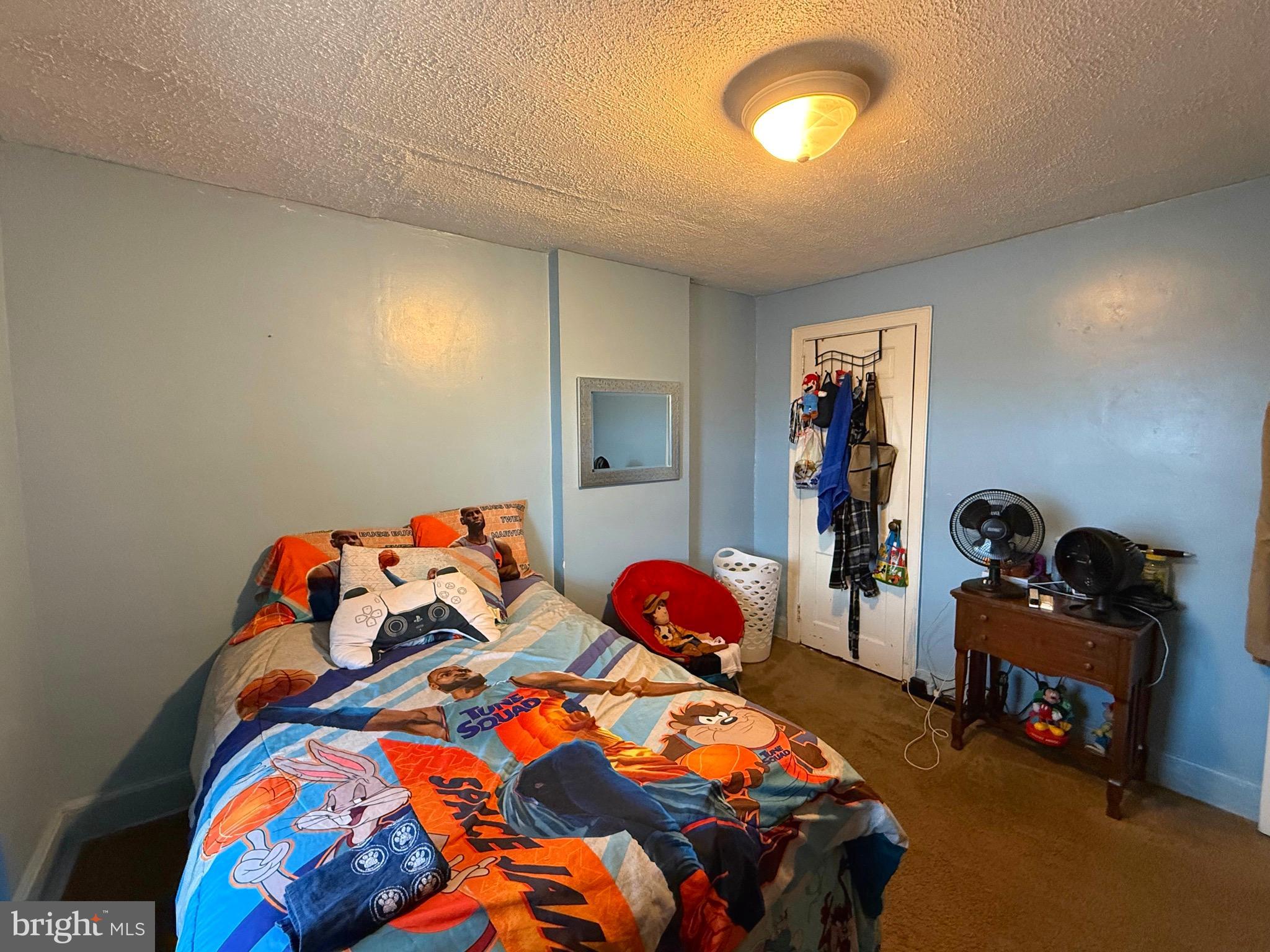 1623 Olympia Road Camden, NJ 08104 - Photo 12 of 23 a bedroom with two beds and a closet