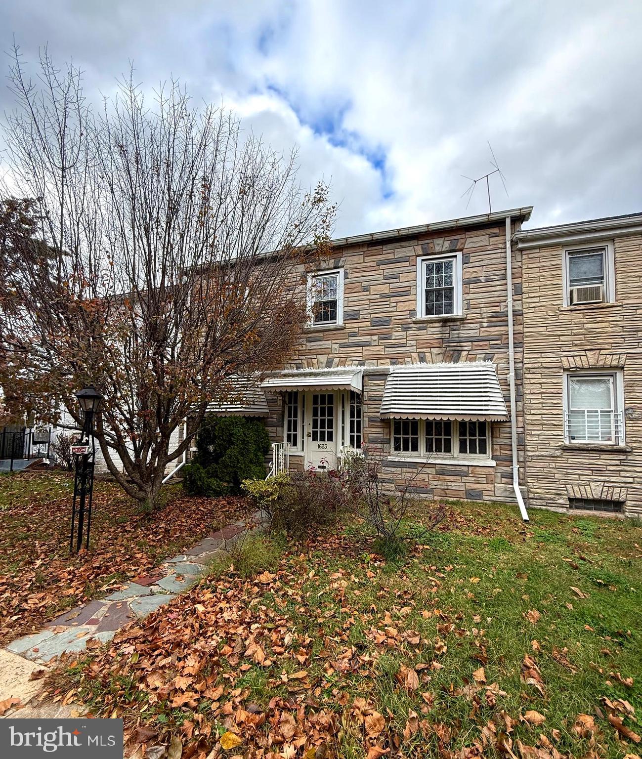 1623 Olympia Road Camden, NJ 08104 - Photo 2 of 23 a view of a house with a yard