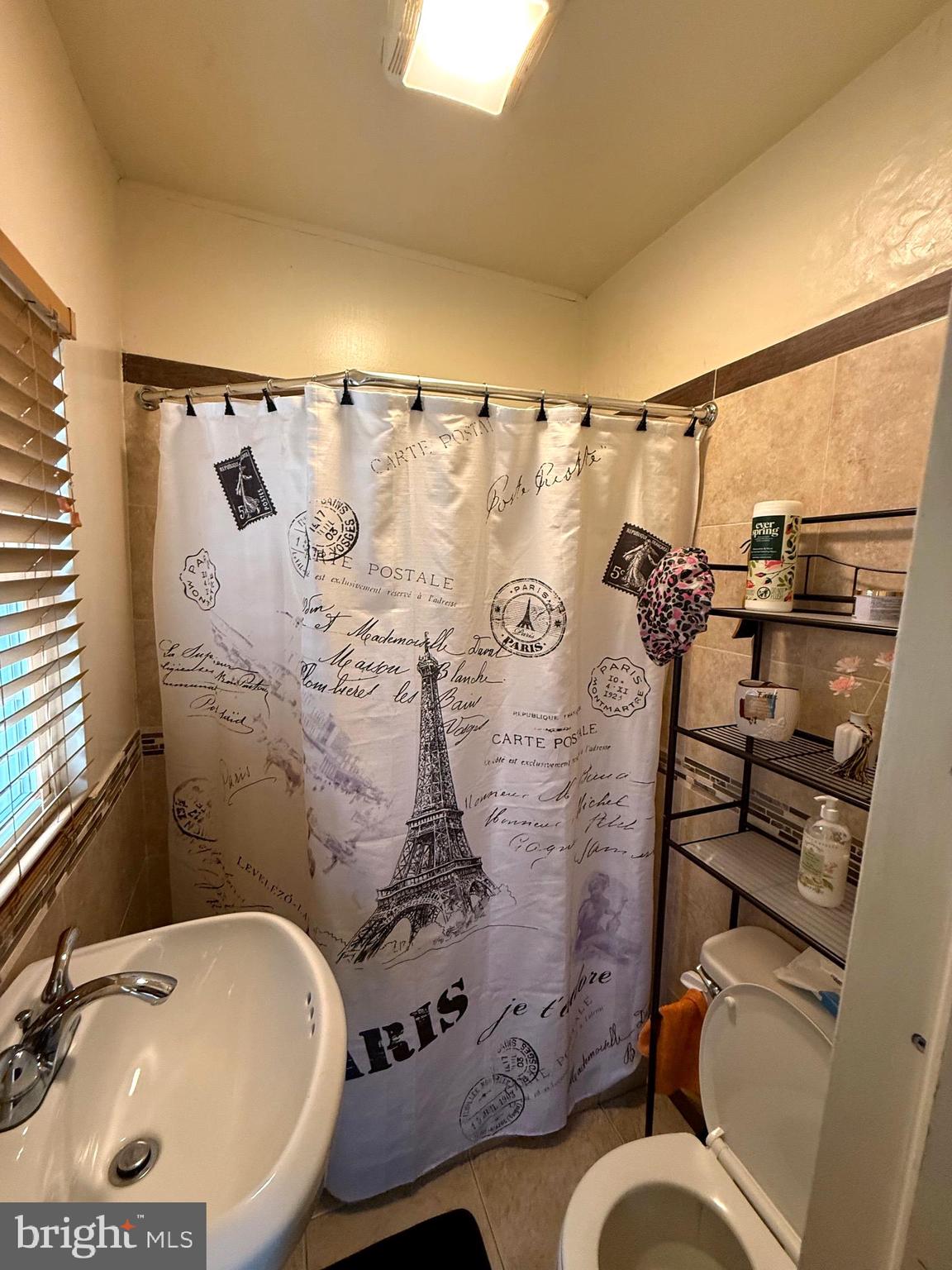 1623 Olympia Road Camden, NJ 08104 - Photo 10 of 23 a bathroom with a sink toilet and shower