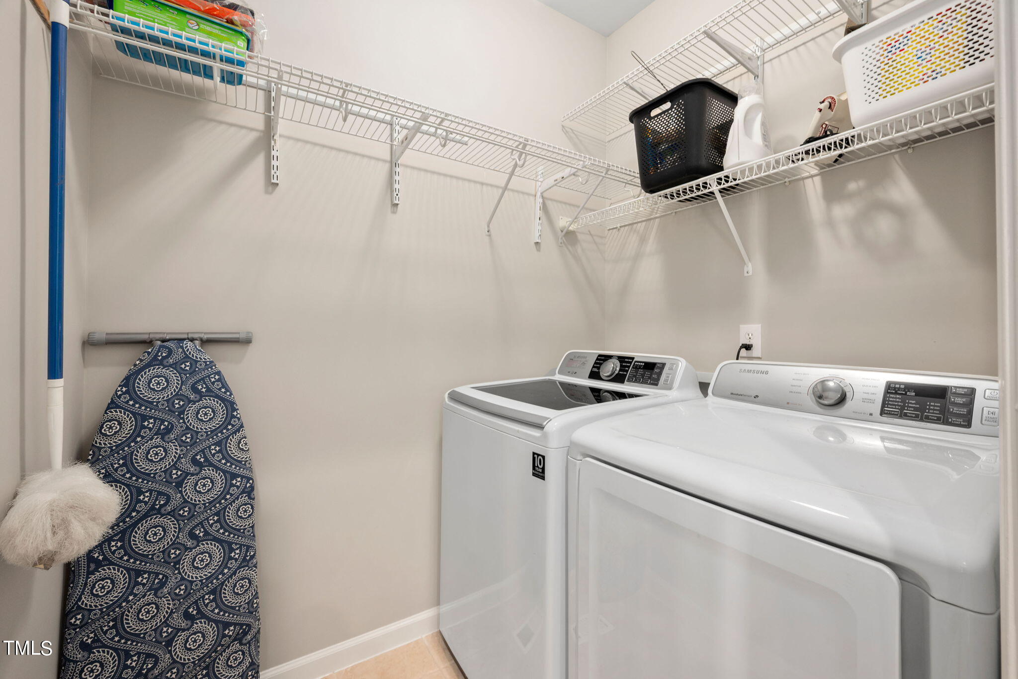 8620 Benzinger Drive Raleigh, NC 27613 - Photo 16 of 51 a utility room with dryer and washer