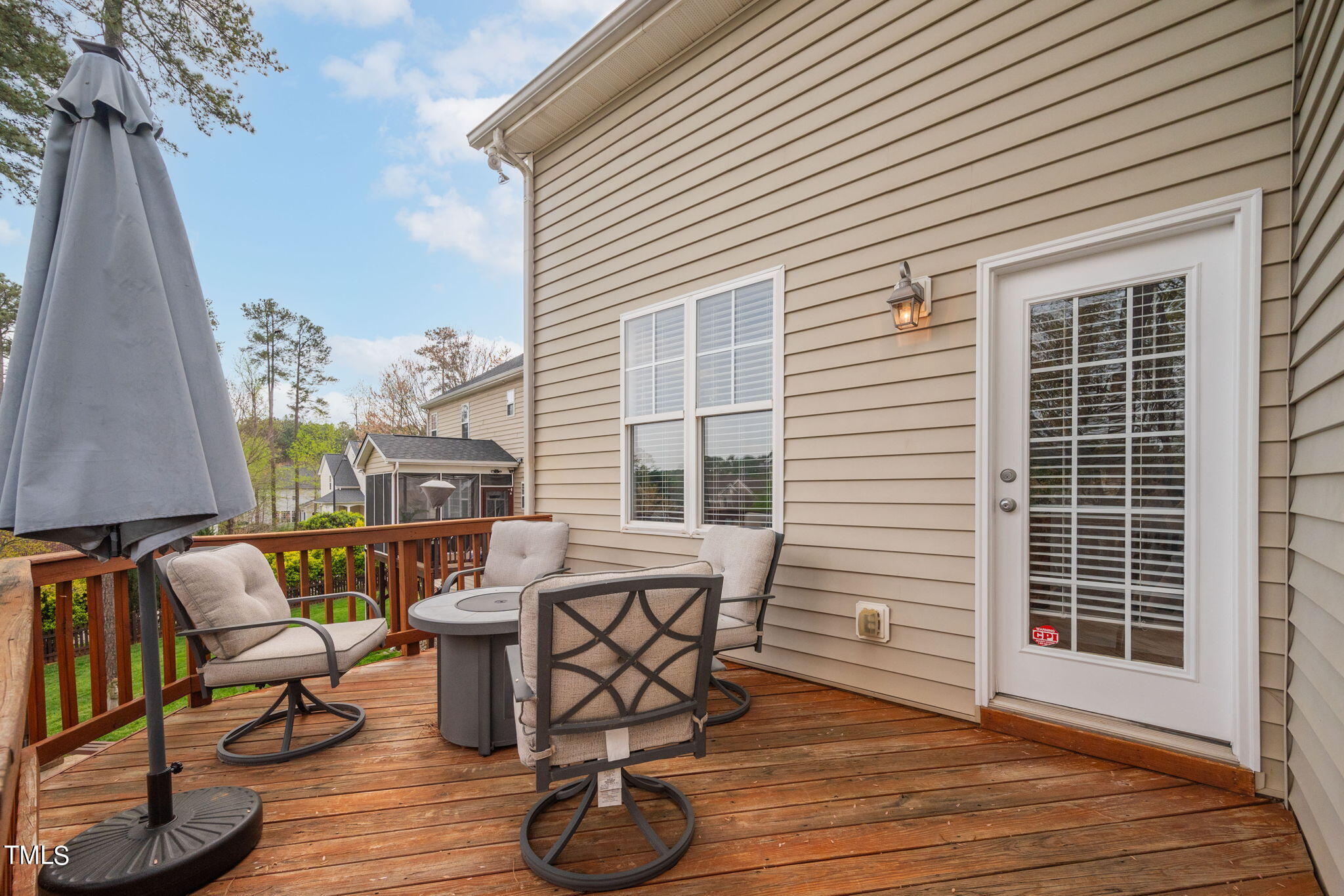 8620 Benzinger Drive Raleigh, NC 27613 - Photo 33 of 51 a view of a chairs and table in patio