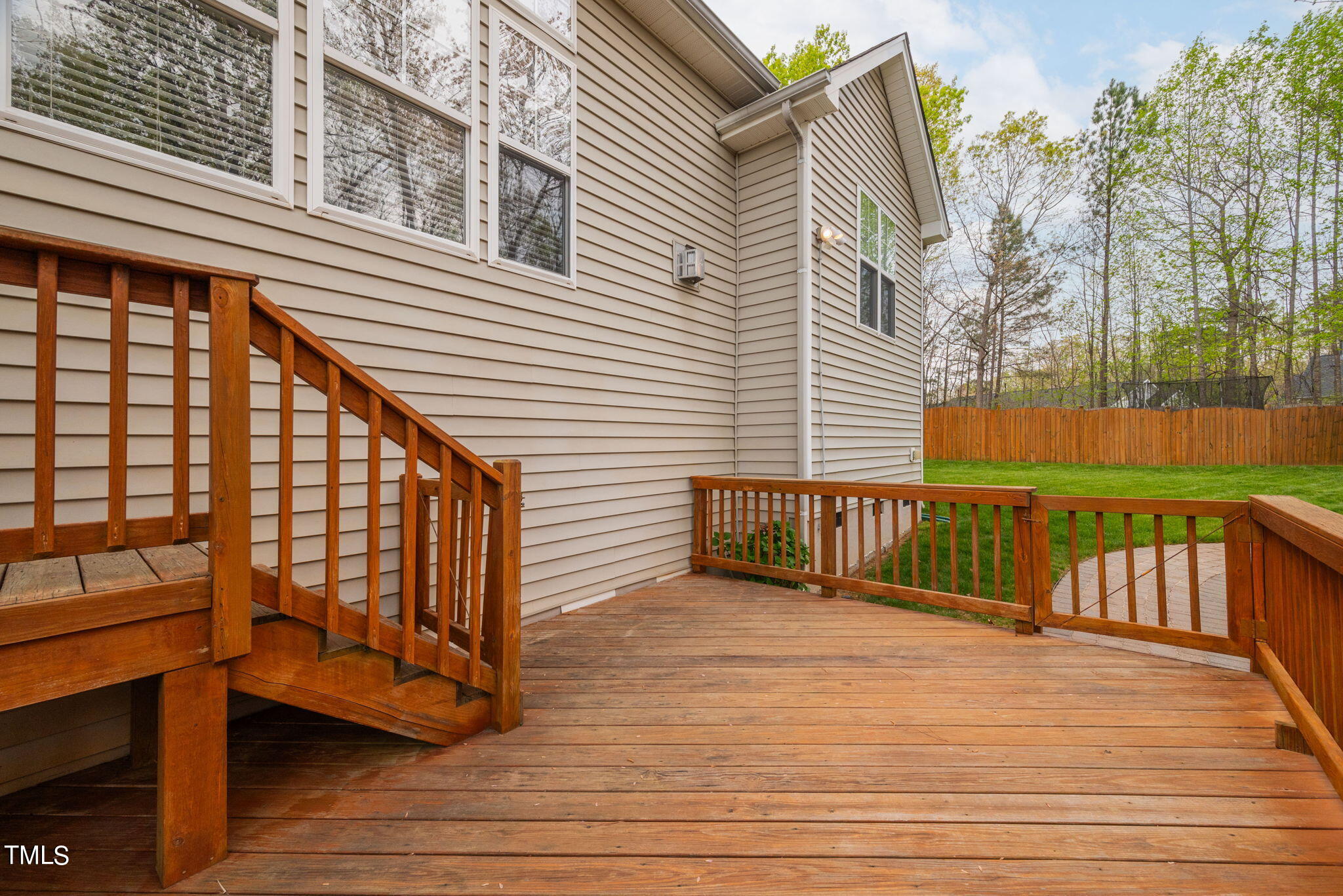 8620 Benzinger Drive Raleigh, NC 27613 - Photo 36 of 51 a view of a balcony with wooden floor and fence