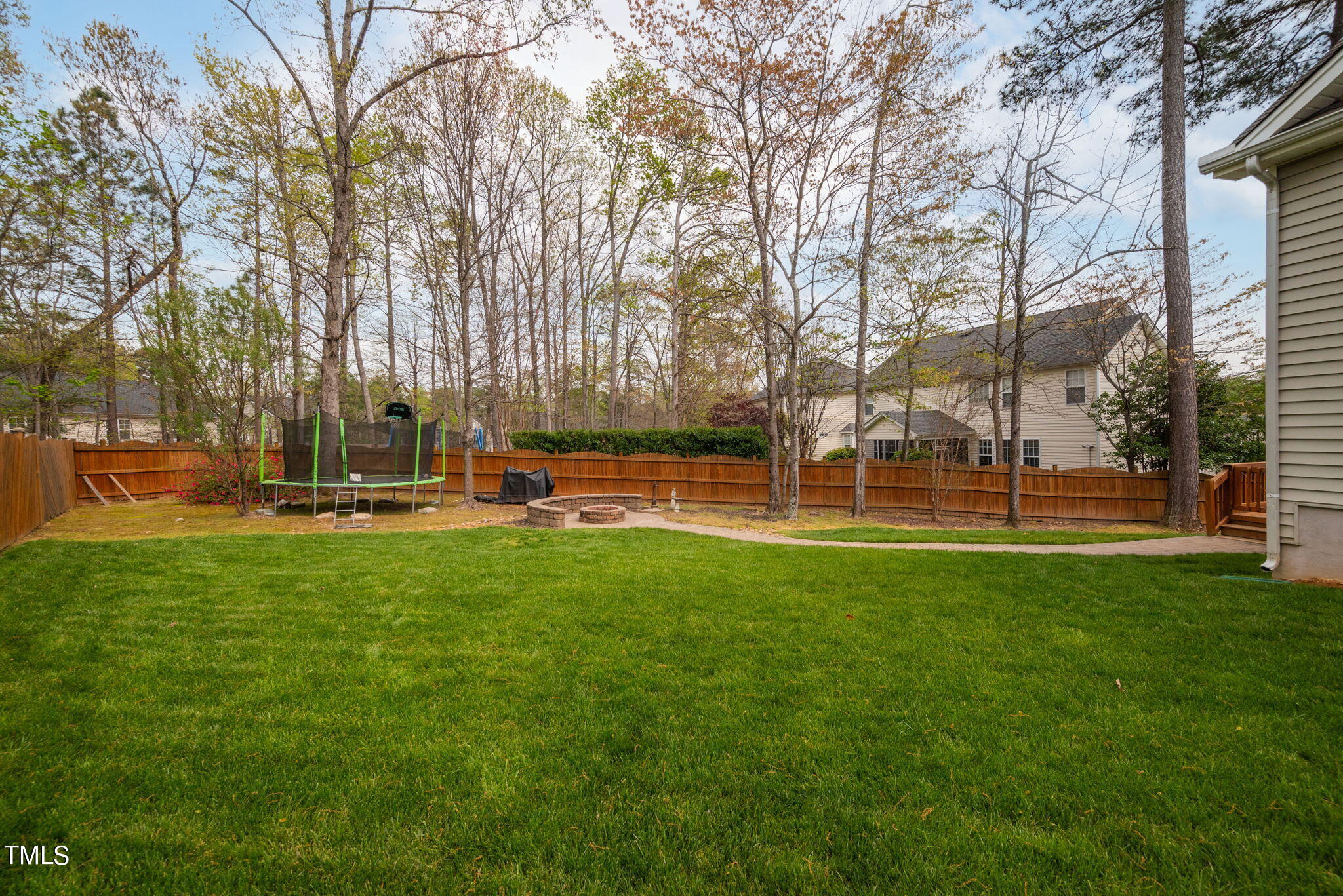 8620 Benzinger Drive Raleigh, NC 27613 - Photo 39 of 51 a view of yard with green space