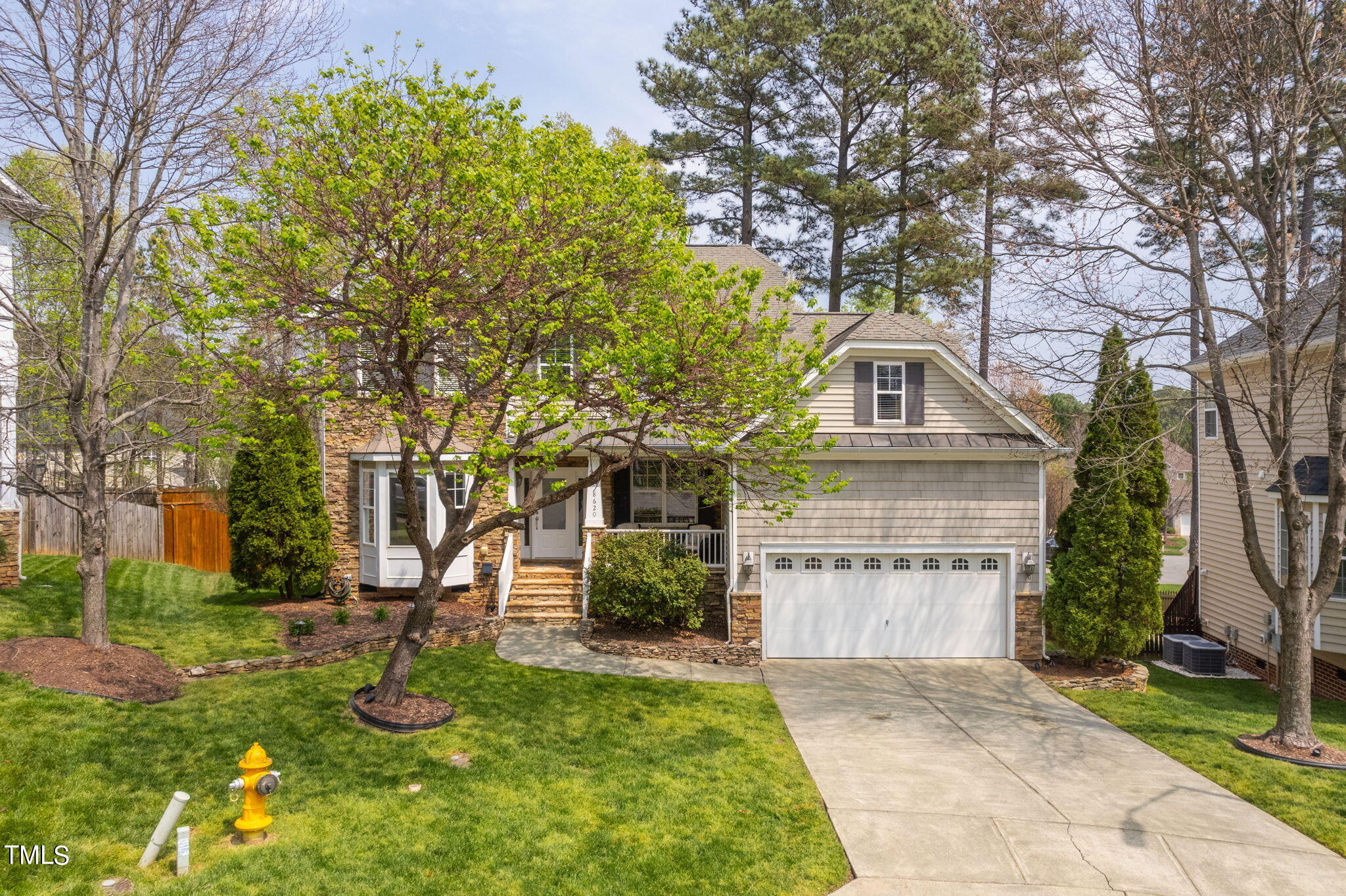 8620 Benzinger Drive Raleigh, NC 27613 - Photo 44 of 51 a view of house with a yard
