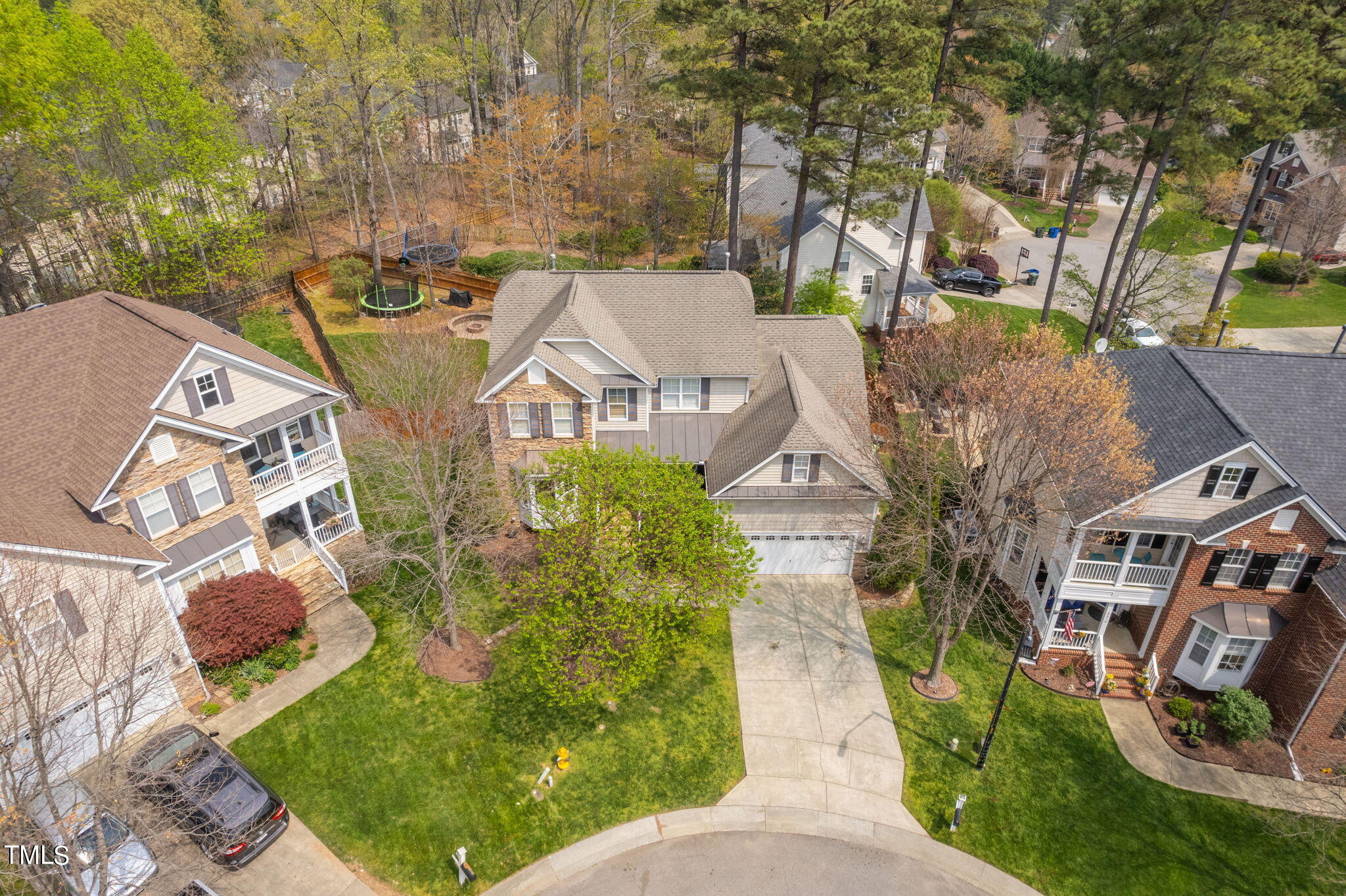 8620 Benzinger Drive Raleigh, NC 27613 - Photo 45 of 51 an aerial view of a house with a yard basket ball court and outdoor seating