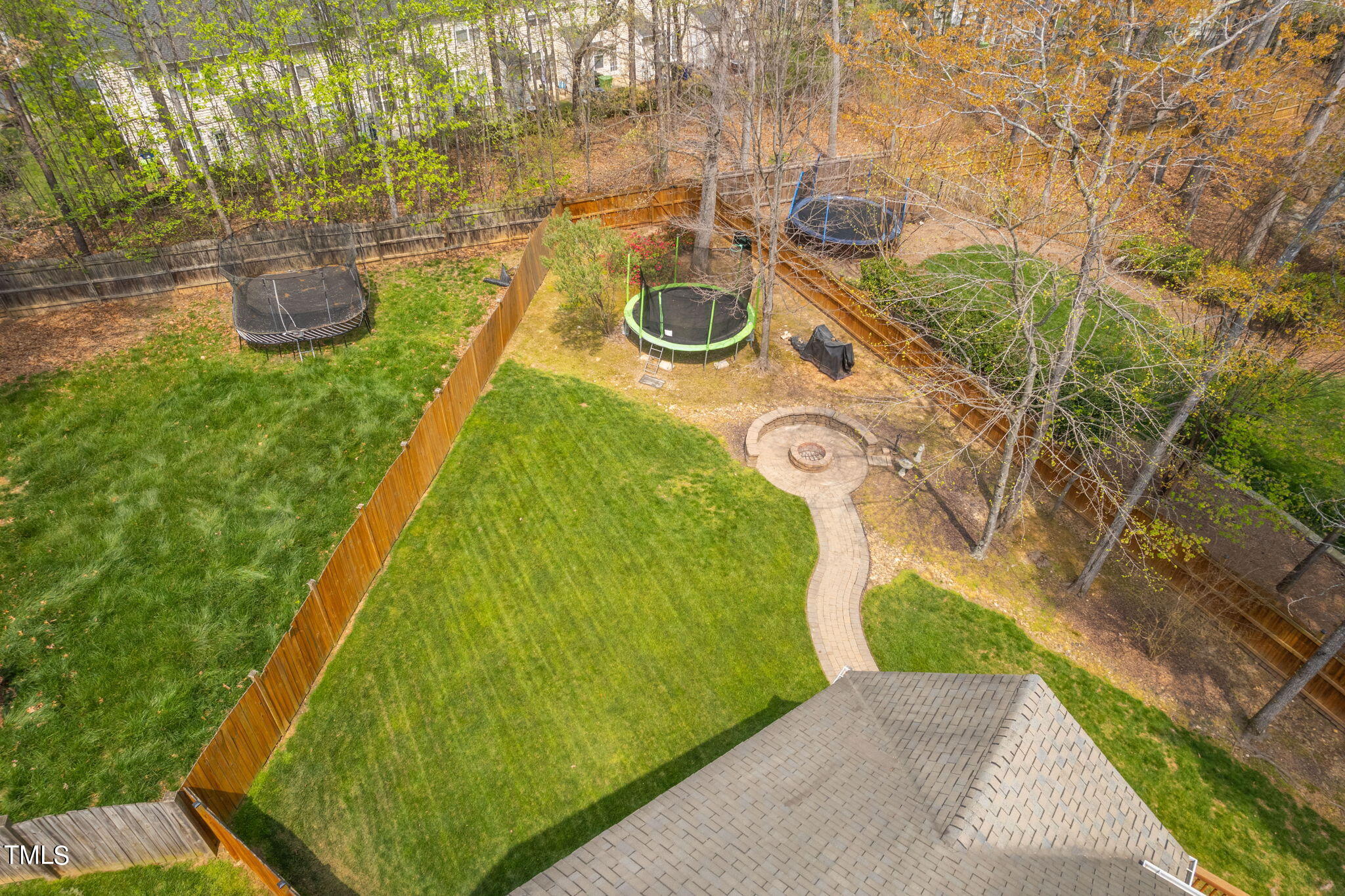 8620 Benzinger Drive Raleigh, NC 27613 - Photo 46 of 51 a view of swimming pool with a backyard