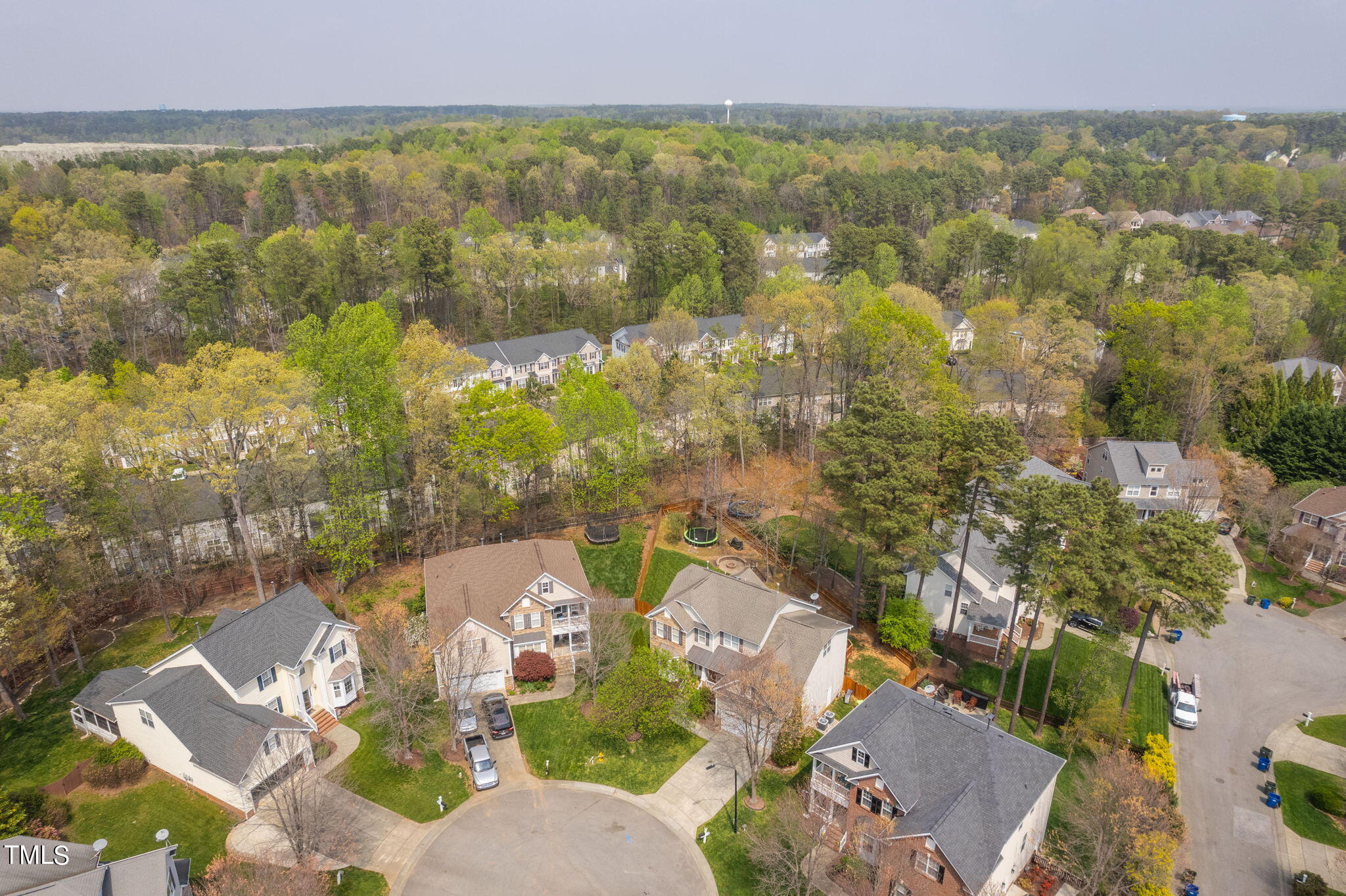 8620 Benzinger Drive Raleigh, NC 27613 - Photo 48 of 51 an aerial view of residential house with outdoor space and trees all around