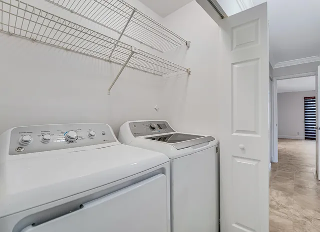 a view of a balcony with a ceiling fan