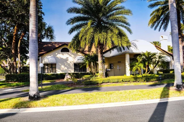 a view of a patio with table and chairs potted plants with wooden floor
