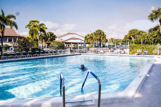 a spacious bathroom with a tub and shower