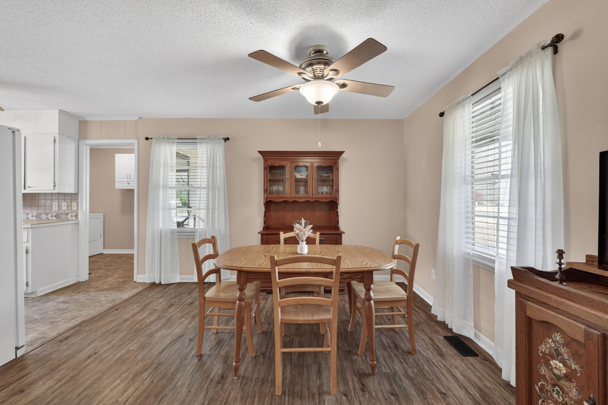 18 Town Road Fayetteville, TN 37334 - Photo 6 of 22 a view of a dining room with furniture window and wooden floor