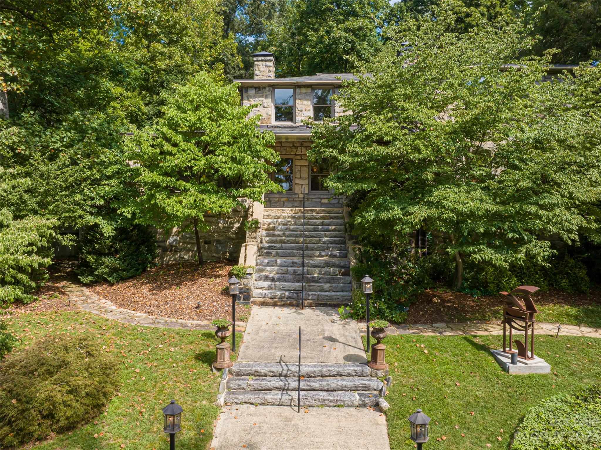 27 Edgewood Road Asheville, NC 28804 - Photo 2 of 48 a view of a yard with plants