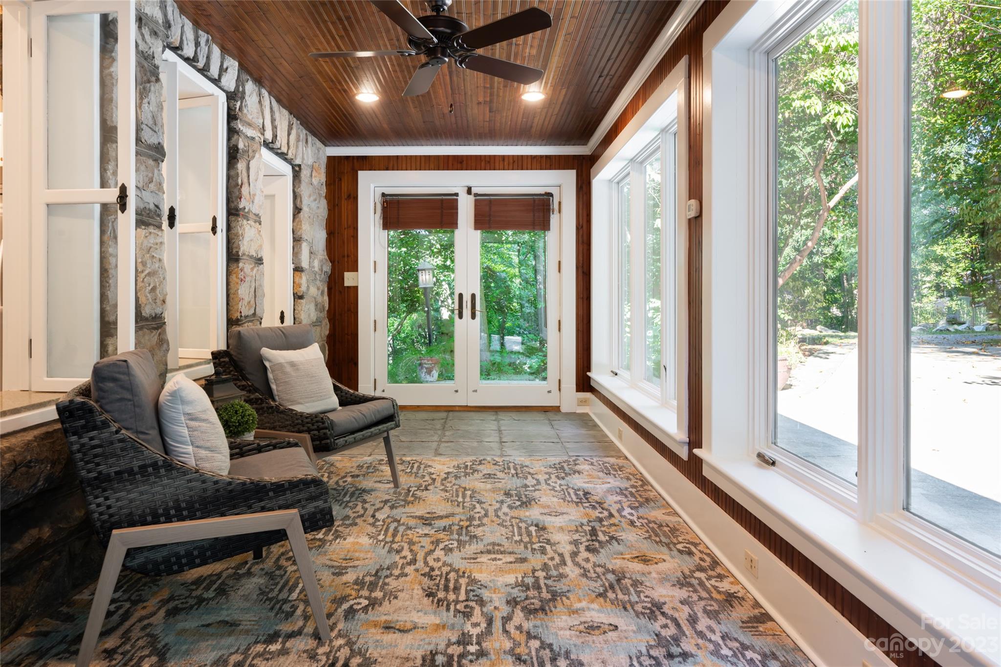 27 Edgewood Road Asheville, NC 28804 - Photo 21 of 48 a living room with furniture and a large window