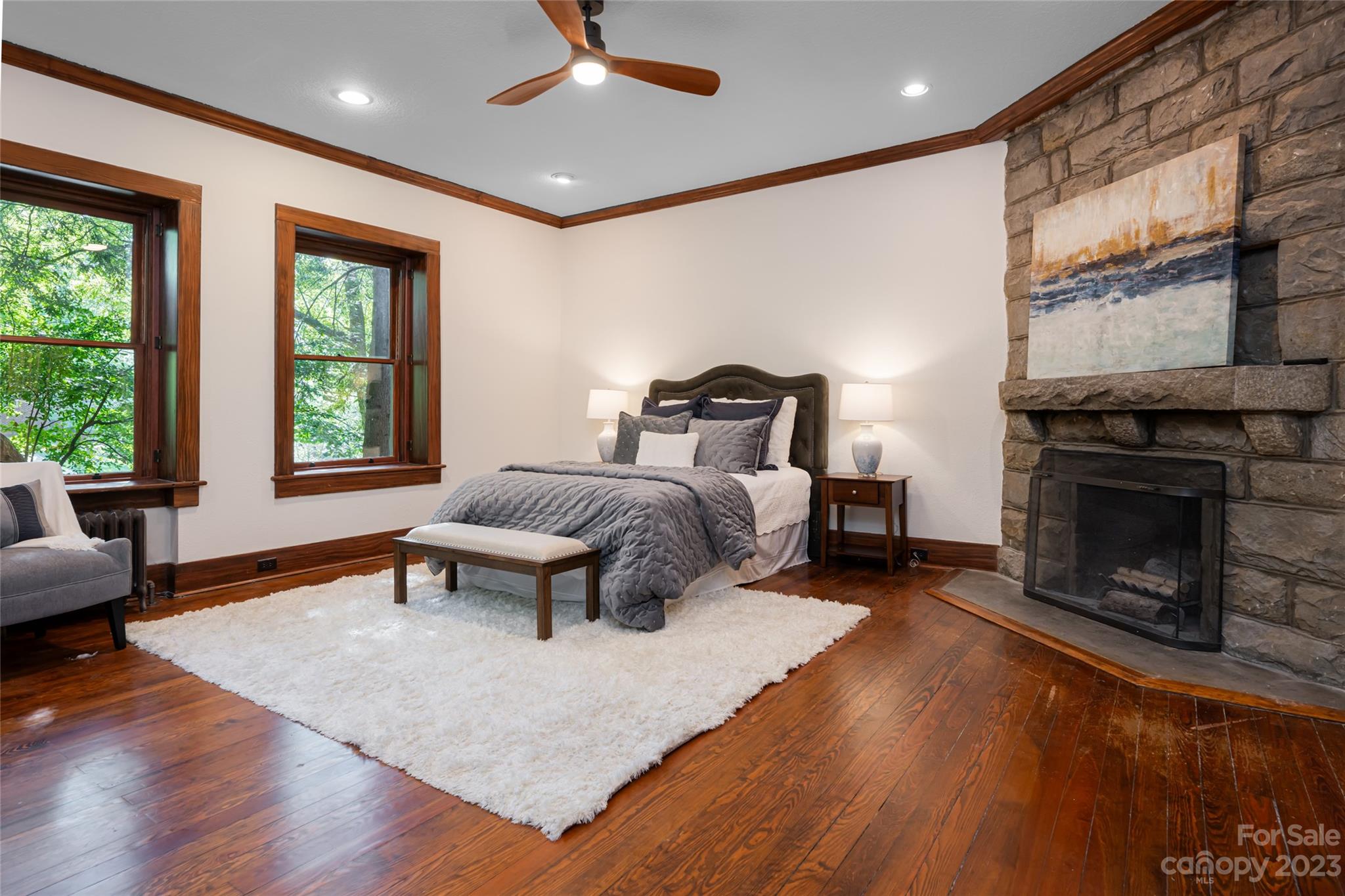 27 Edgewood Road Asheville, NC 28804 - Photo 23 of 48 a bedroom with a bed and a fireplace