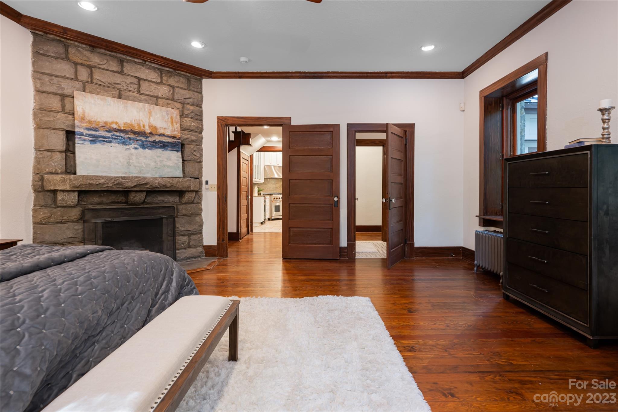 27 Edgewood Road Asheville, NC 28804 - Photo 24 of 48 a living room with furniture and a flat screen tv