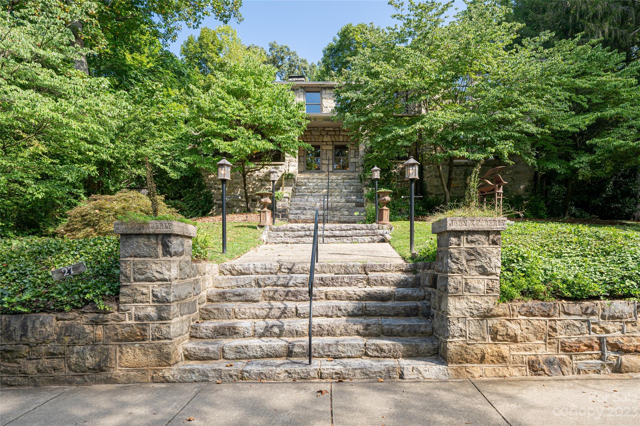 27 Edgewood Road Asheville, NC 28804 - Photo 3 of 48 a front view of a house with trees