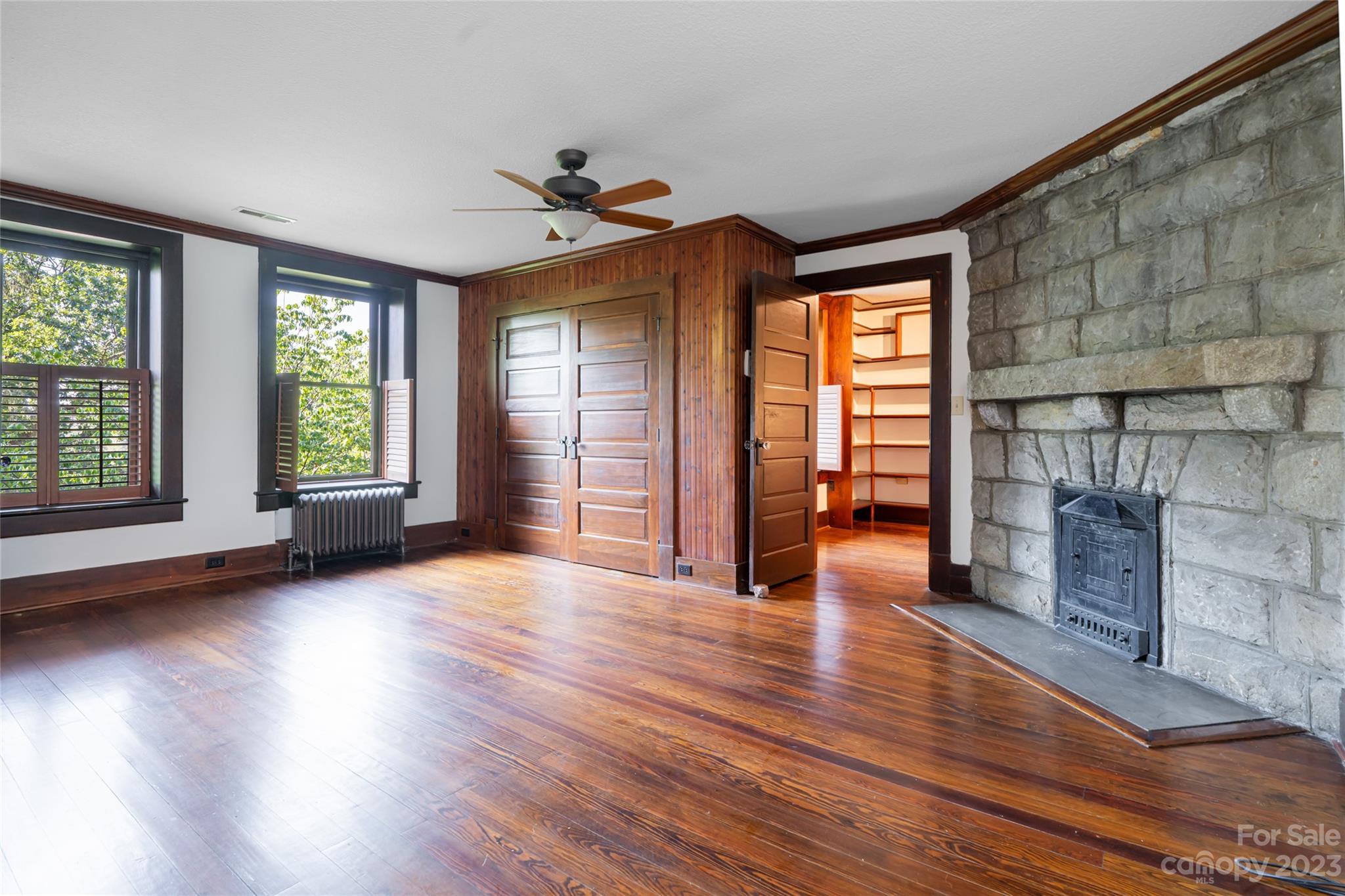 27 Edgewood Road Asheville, NC 28804 - Photo 33 of 48 wooden floor in an empty room with a window