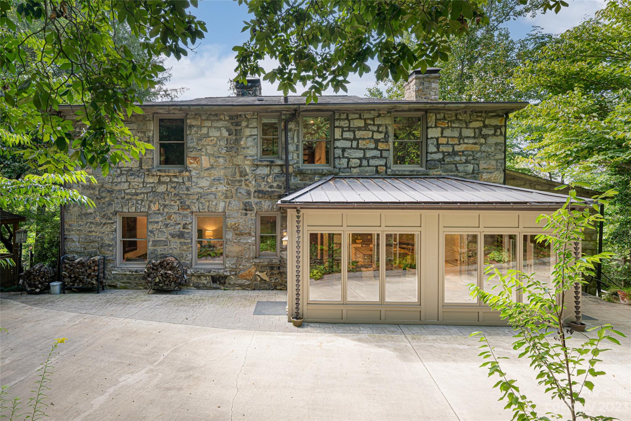 27 Edgewood Road Asheville, NC 28804 - Photo 41 of 48 a front view of a house with a garden