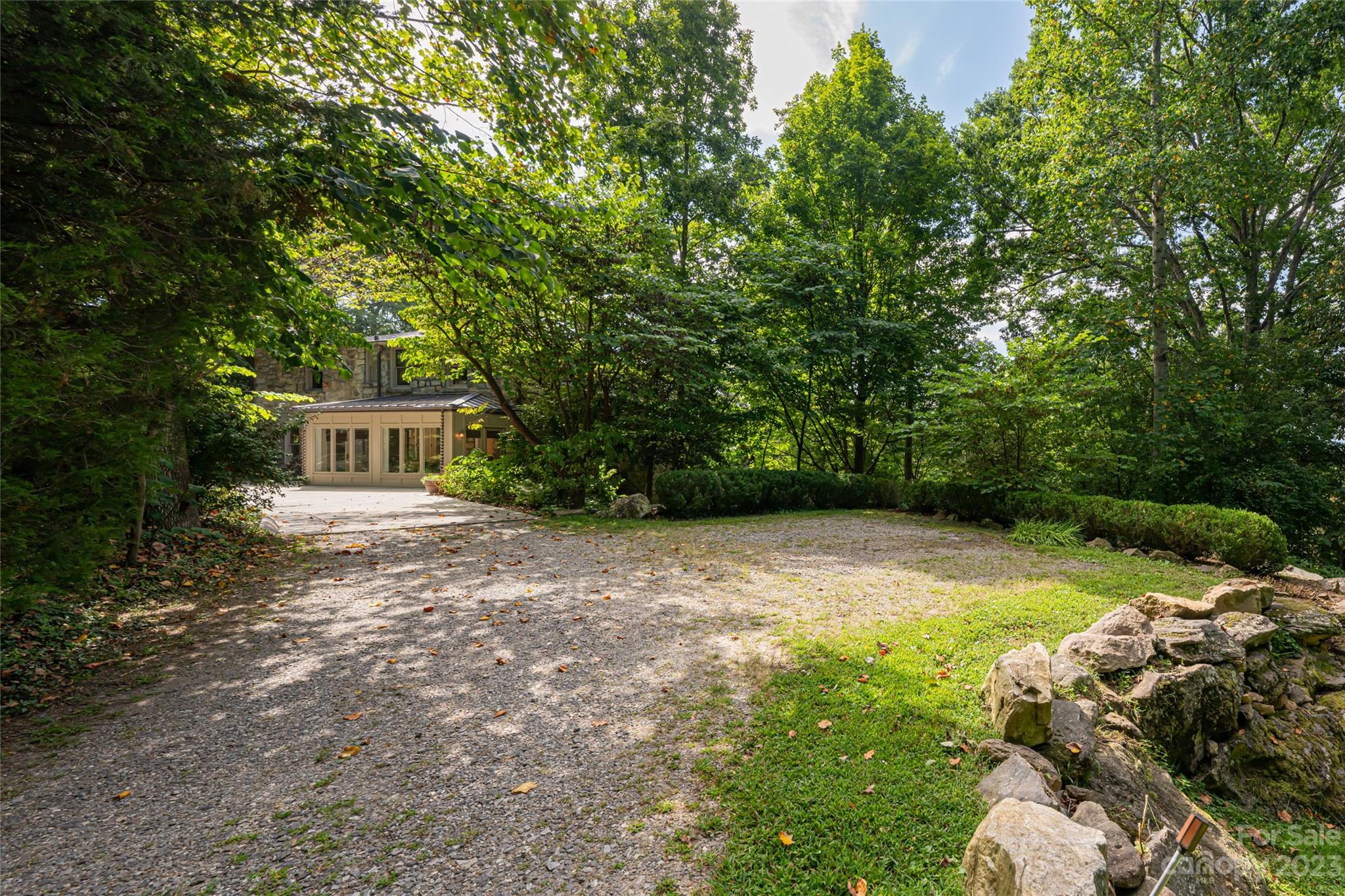 27 Edgewood Road Asheville, NC 28804 - Photo 47 of 48 a view of a house with yard and a tree