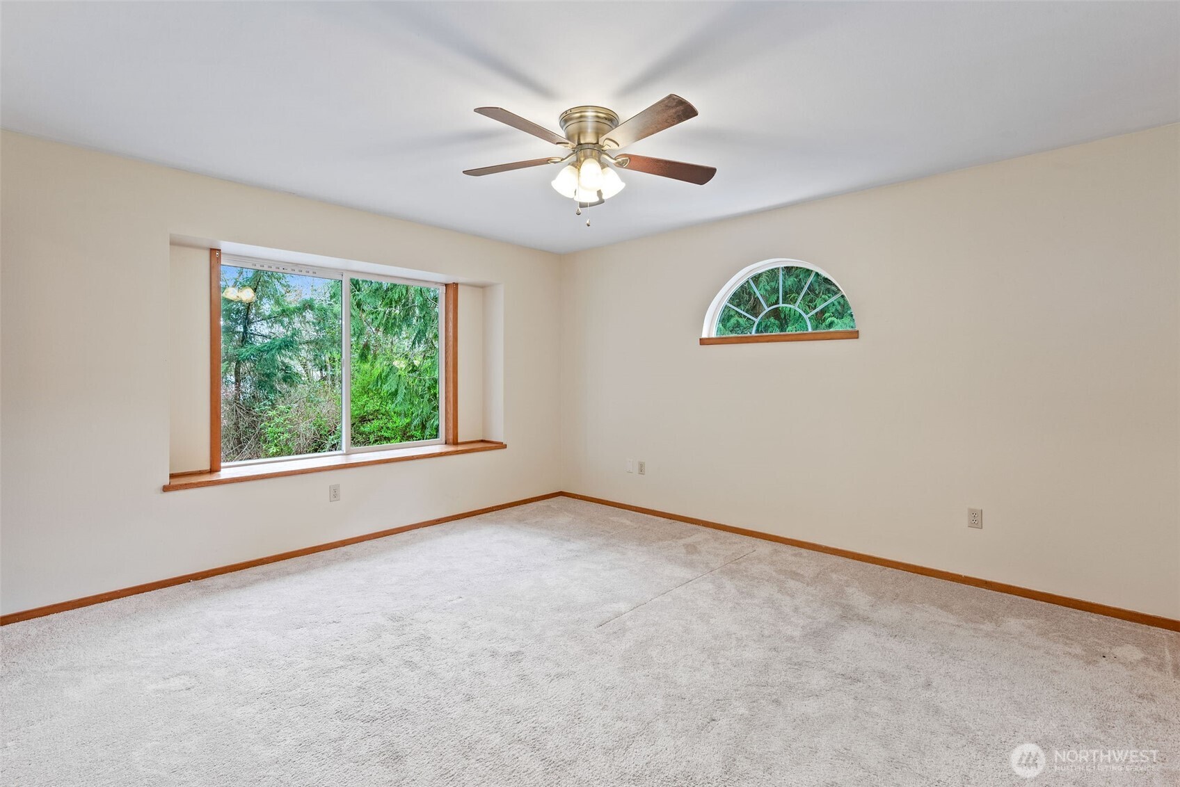 38 Brighton Street Port Hadlock, WA 98339 - Photo 20 of 37 an empty room with windows and ceiling fan