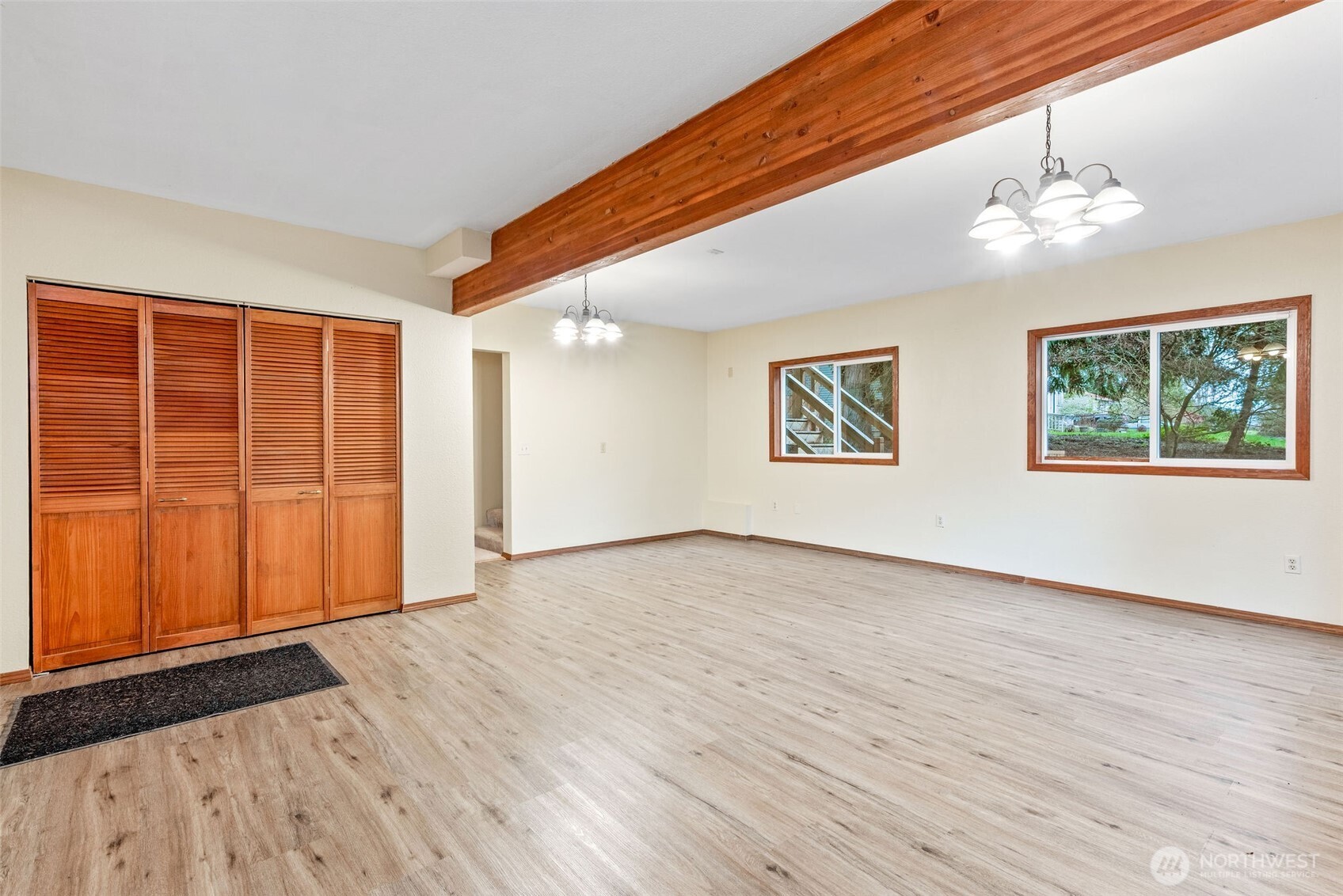 38 Brighton Street Port Hadlock, WA 98339 - Photo 28 of 37 a view of an empty room with wooden floor and a window