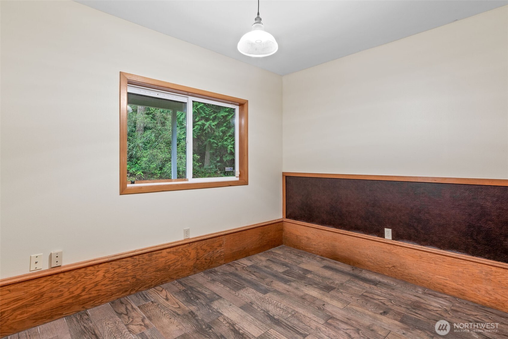 38 Brighton Street Port Hadlock, WA 98339 - Photo 33 of 37 an empty room with wooden floor and windows