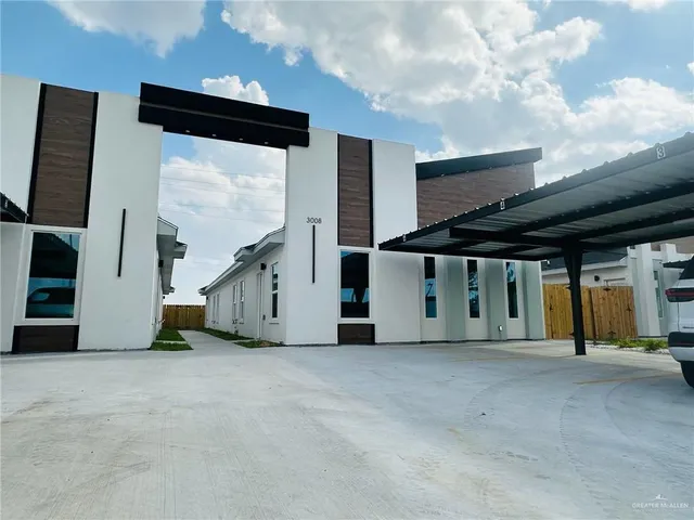 a view of a big room with staircase