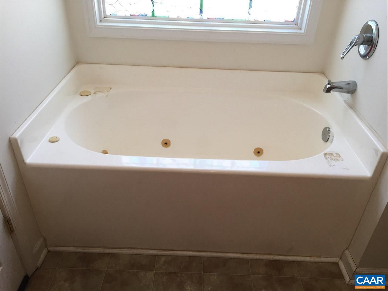 550 Walnut Shade Road Louisa, VA 23093 - Photo 13 of 28 a bathroom with a bathtub