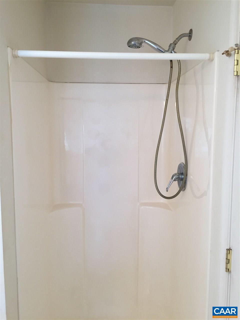 550 Walnut Shade Road Louisa, VA 23093 - Photo 15 of 28 a bathroom with a shower