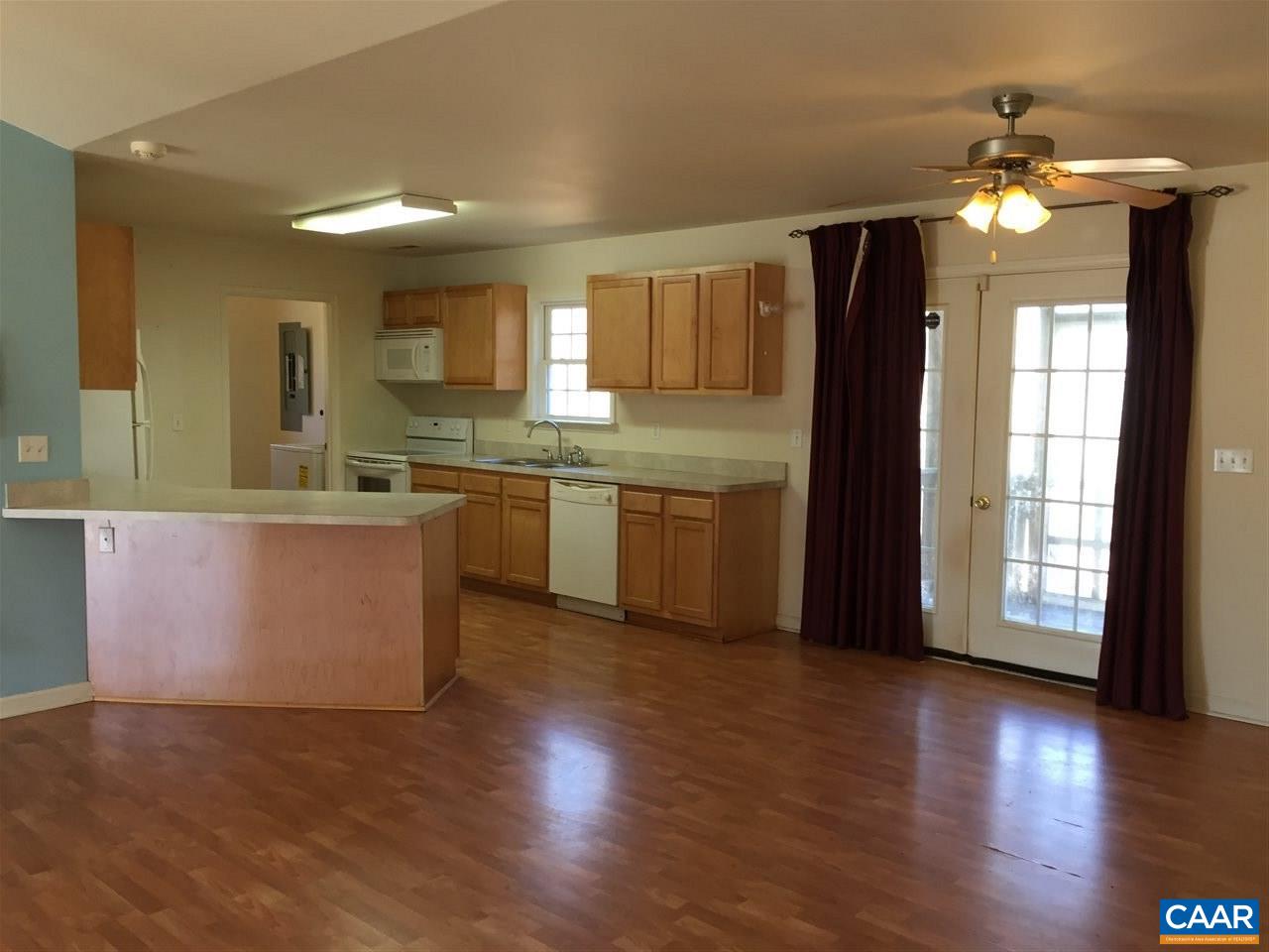 550 Walnut Shade Road Louisa, VA 23093 - Photo 5 of 28 a view of a kitchen with cabinets and wooden floor