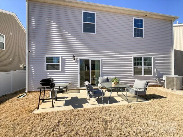 a view of a lounge chairs in the back