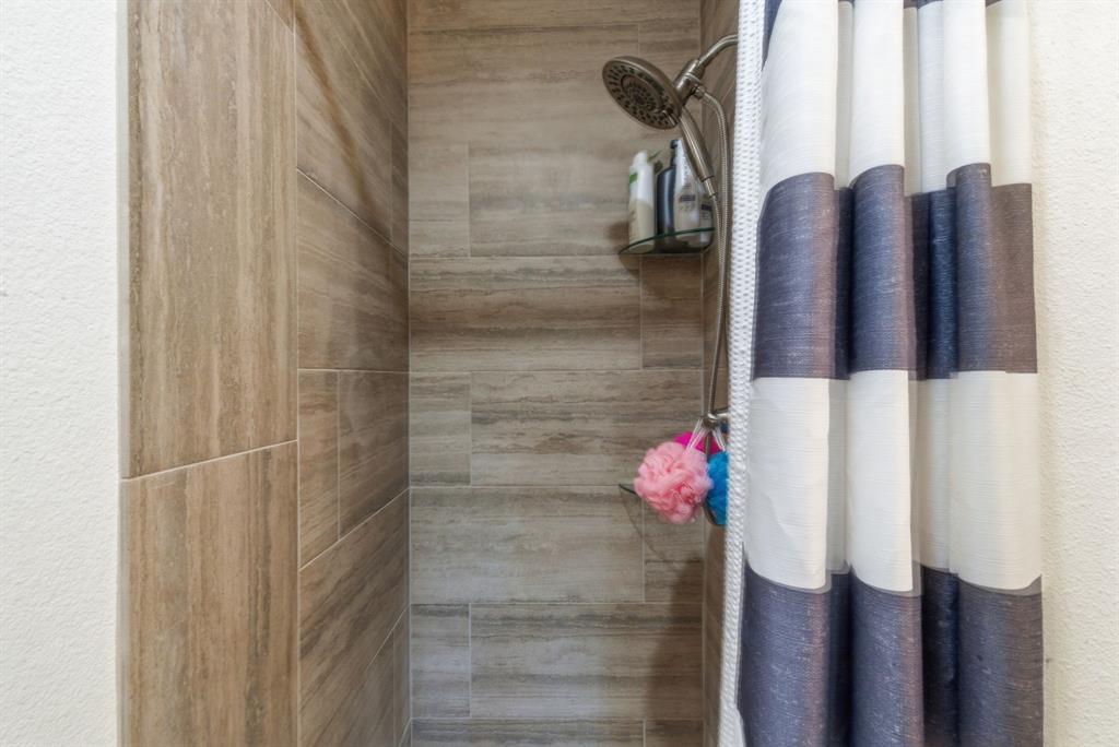 330 Chism Trail Gordon, TX 76453 - Photo 13 of 35 a bathroom with a shower