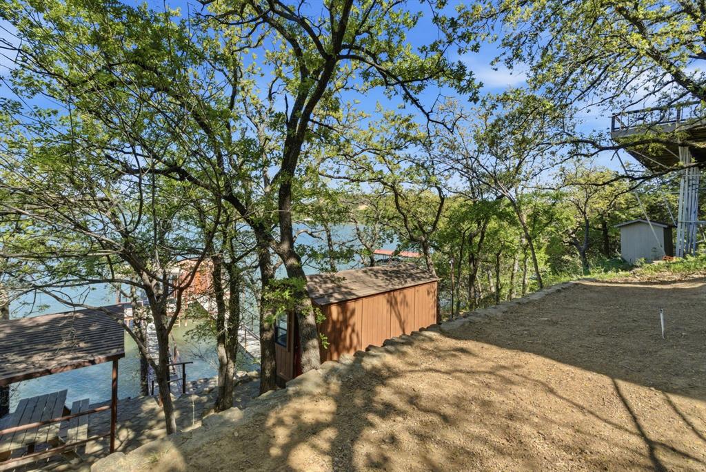 330 Chism Trail Gordon, TX 76453 - Photo 27 of 35 a street view with large trees
