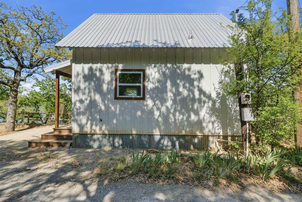 330 Chism Trail Gordon, TX 76453 - Photo 28 of 35 a front view of a house with a yard