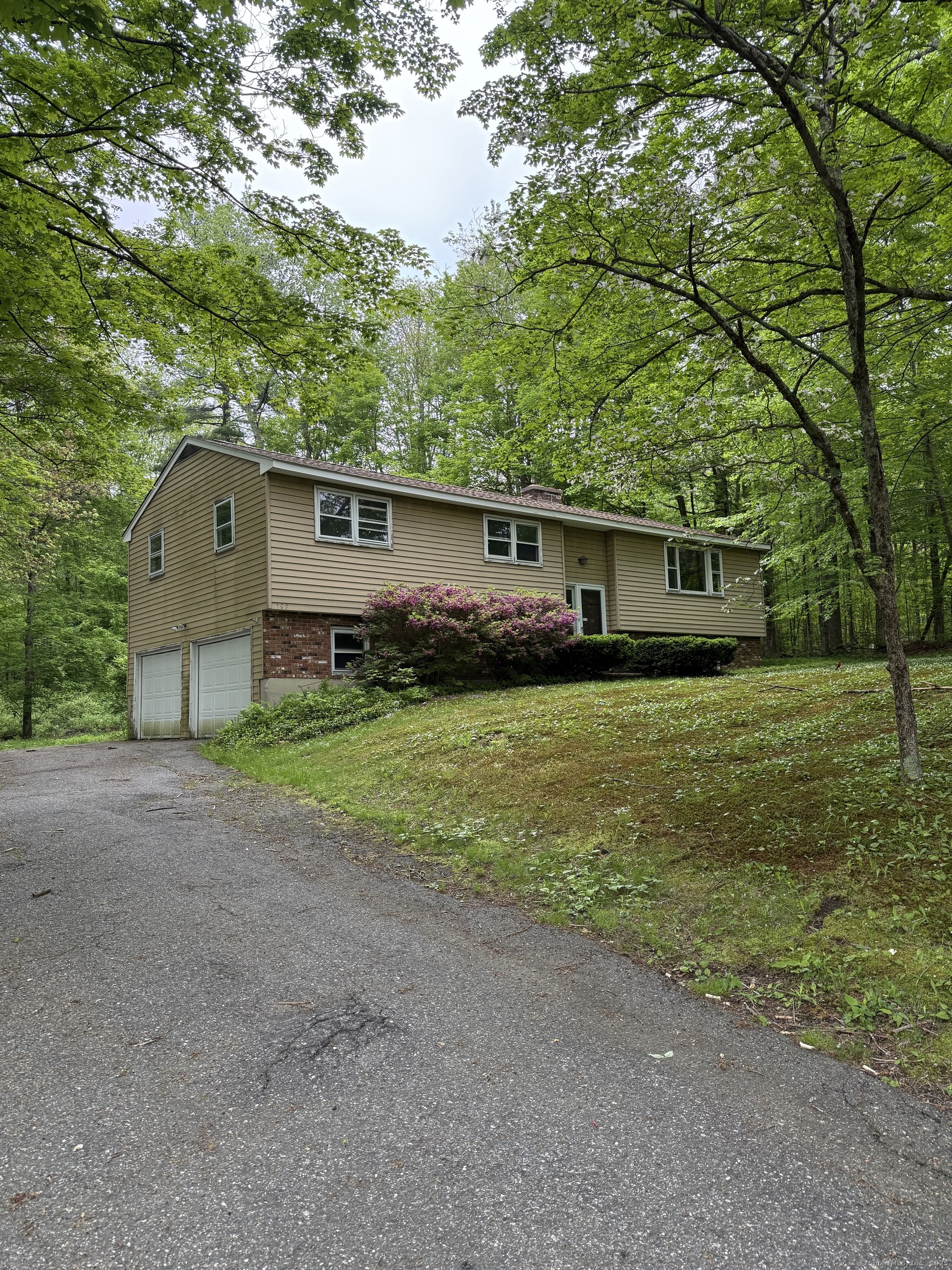 197 Meyer Road Torrington, CT 06790 - Photo 1 of 1 a house view with a garden space