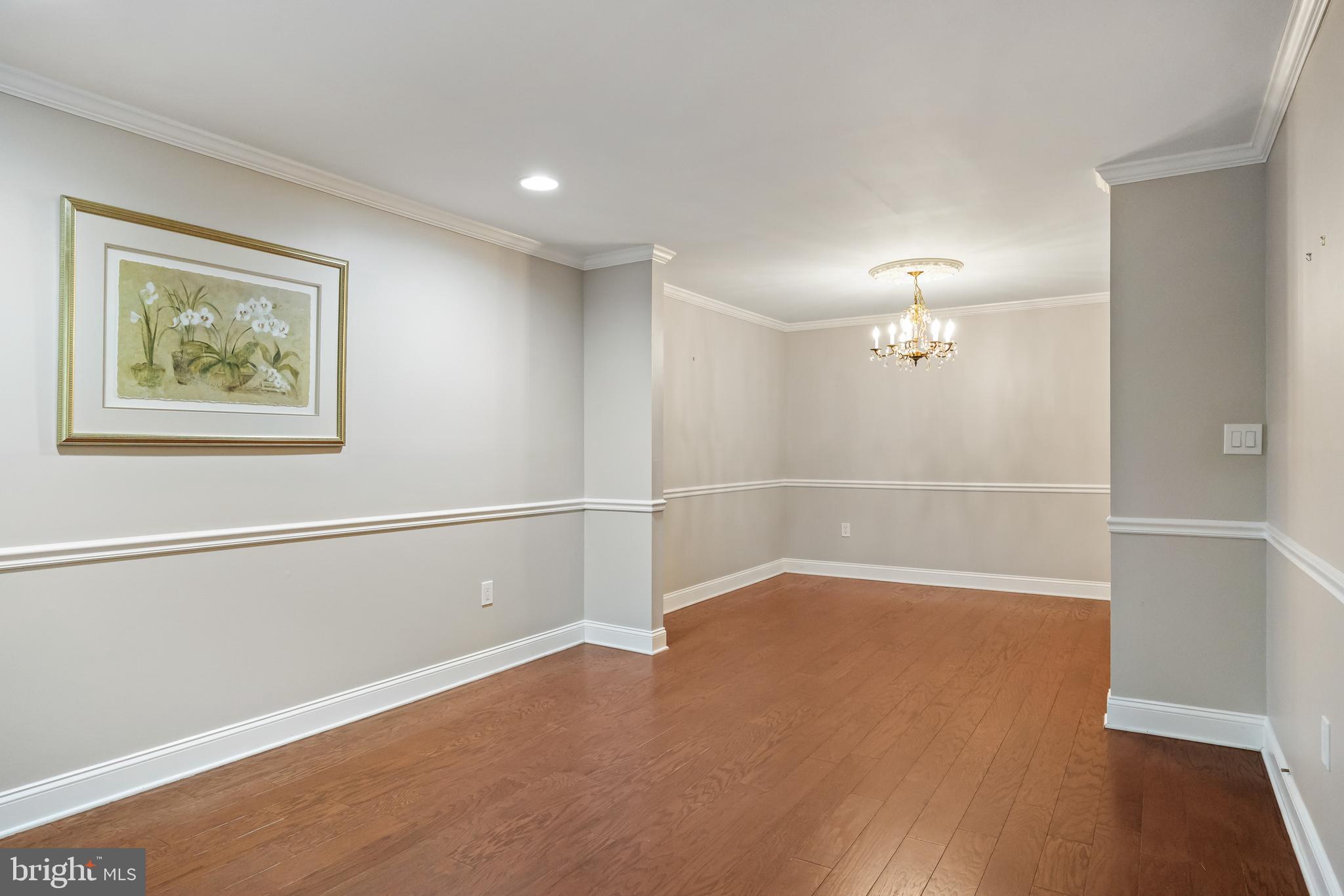 5105 Halifax Way Mount Laurel, NJ 08054 - Photo 6 of 26 a view of an empty room with wooden floor