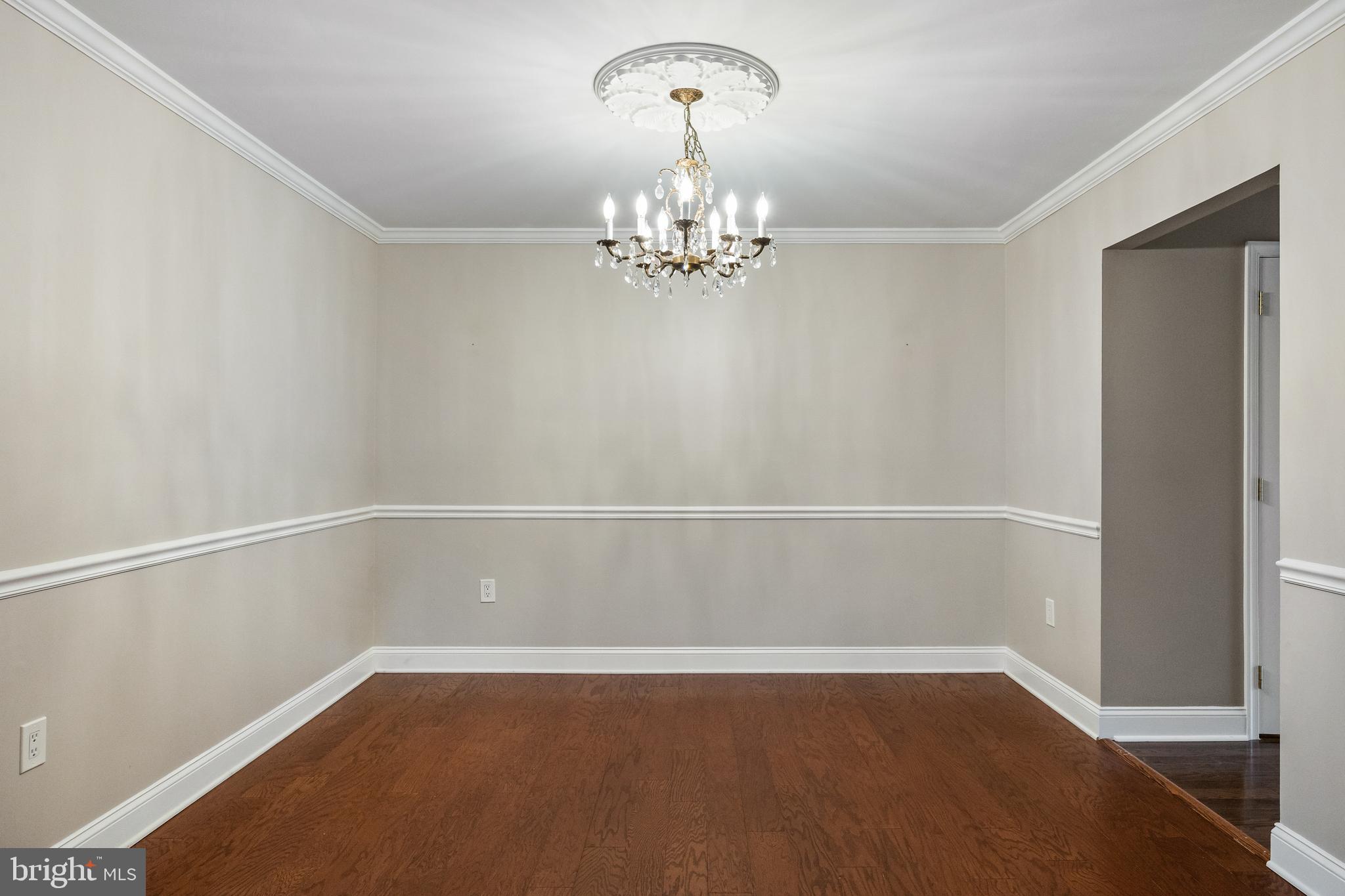 5105 Halifax Way Mount Laurel, NJ 08054 - Photo 7 of 26 a view of an empty room with chandelier