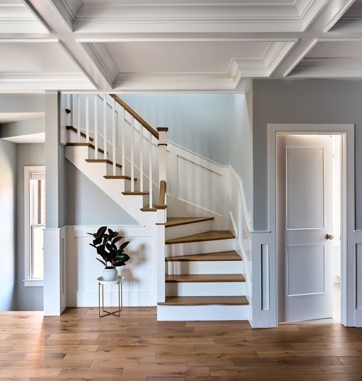 42 Bow Street, Unit 2 Somerville, MA 02143 - Photo 8 of 14 a view of entryway and hall with wooden floor