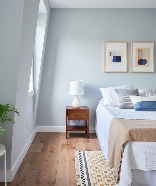 42 Bow Street, Unit 2 Somerville, MA 02143 - Photo 10 of 14 a bedroom with a bed and a window