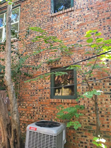 a view of house with patio outdoor seating space
