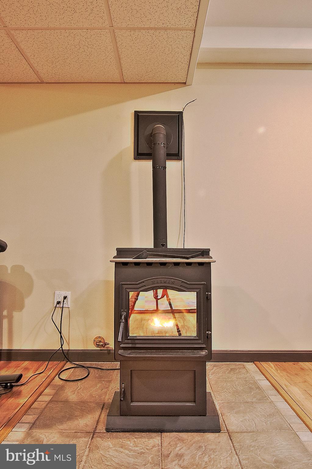 13 Shade Road Oley, PA 19547 - Photo 29 of 48 Basement Pellet Stove